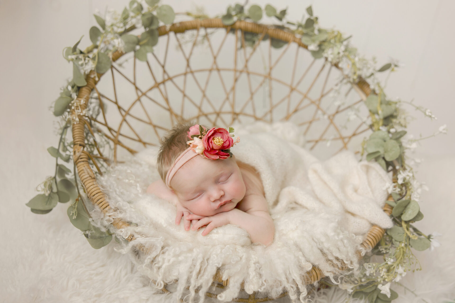 Best San Diego Newborn Photographer cute Newborn baby swaddled in soft blanket