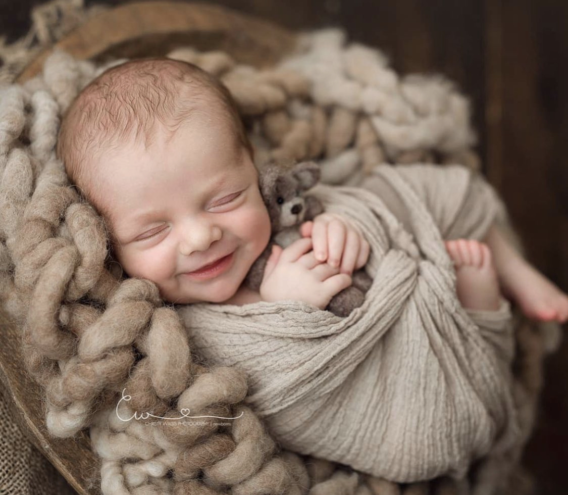 Best San Diego newborn photographer — sleepy swaddle
